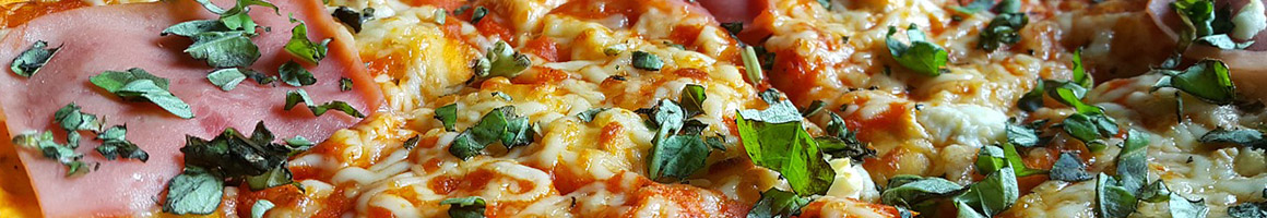 Eating Italian Pizza at Pisano's Pizzeria & Italian Kitchen restaurant in Kennesaw, GA.